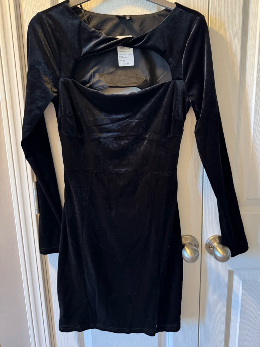 Windsor Black Velvet Long-Sleeve peekaboo, open back Sheath Dress, fitted.